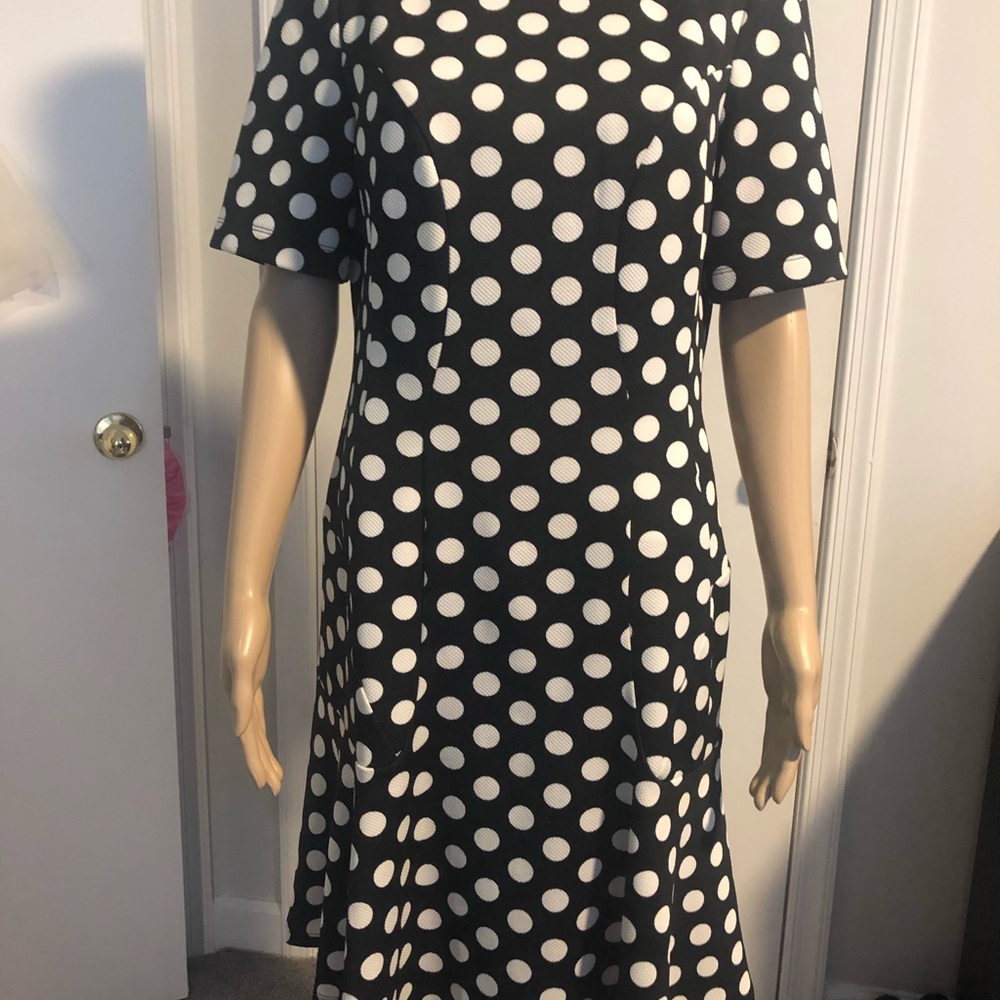 Danny & Nichol black dress with white polka dots.